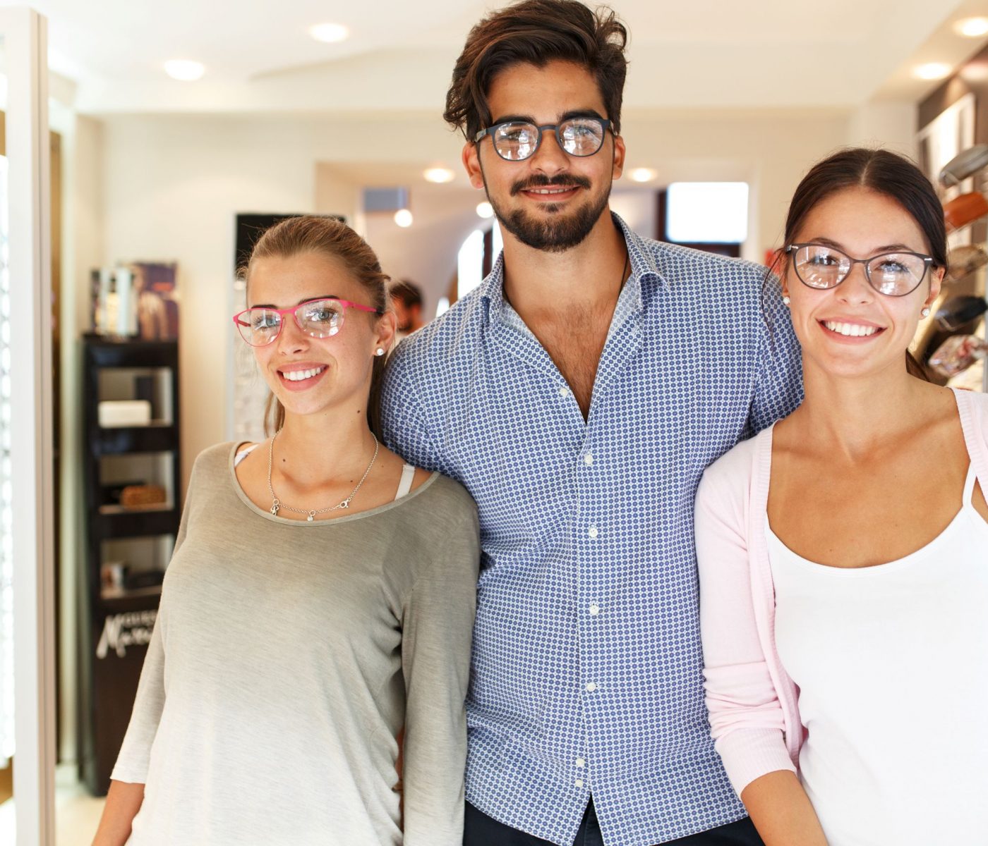 group-of-friends-wearing-glasses-optical-shop group-of-friends-wearing-glasses-optical-shop